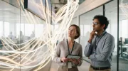 Is the Corporate Wellness Industry Solving Employee Financial Stress — or Monetizing It?